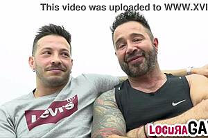 John Brachalli's big cock in gay anal action on a couch