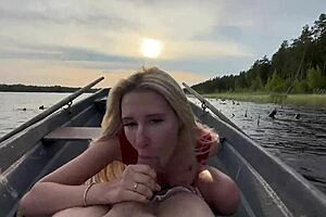 Amateur couple enjoys funny outdoor sex on lake boat