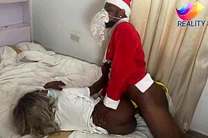 christmas couple celebrates in bedroom with muscular friend