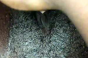 this ebony babe with small tits is all alone, playing with her wet pussy in a casual way, getting it all wet and ready for some solo fun