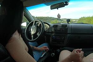 hey, wanna see a hot brunette give a handjob on a public road?
