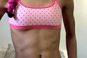 Barely legal petite 18+ teen reveals puffy pussy while playing with toys.