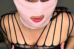 Naughty masked babe pounds her pussy for more pleasure