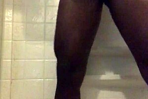 Hot guy jerks his cock in the shower and finishes with a cumshot