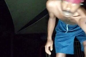 Cute athletic girl works out in park