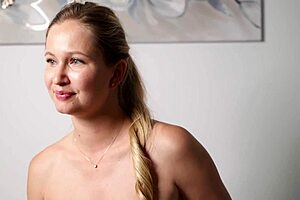 Stunning beauty fingers her tight ass in solo play