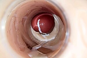 Camera deep inside hairless pussy films massive sperm ejaculation