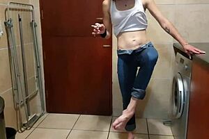 pisswhore pees in her jeans while smoking and stripping