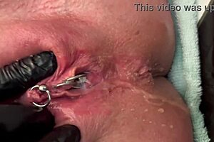 pierced clit gets intense rubbing in latex with wild pee stream