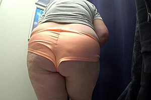 camera in fitting room catchin big ass milf changin clothes