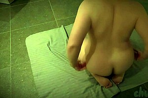 Chubby amateur Chubbykaot caresses herself on the floor outdoors