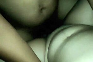 Chubby Asian woman gets wet pussy fucked.