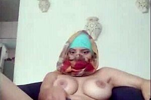 I am a real amateur arab milf in hijab masturbating to squirting orgasm on webcam while husband is away.