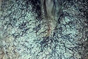 ebony babe engages in homemade pussy play with dripping wet beaver