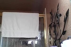 Shower time with the girl bathing and masturbating in the bathroom