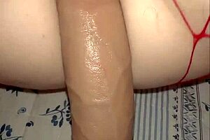 Petite redhead's soft pussy takes monster dildo in part one