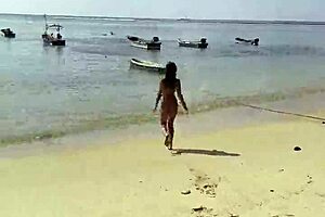 Monika Fox poses on beach