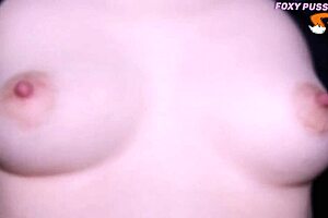 Young wife with small tits reaches orgasm from close-up nipple sucking play.