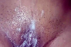 Brunette Colombian bride with big tits and huge ass uses dildo in homemade shower sex