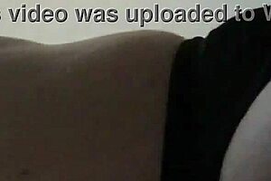 amateur performs in bent over doggystyle position