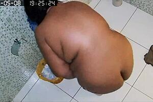 Hidden camera catches busty chubby neighbor shaving her huge pussy in the bath