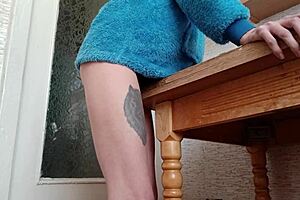 Skinny brunette is rubbing her pussy right on the kitchen table, you know?