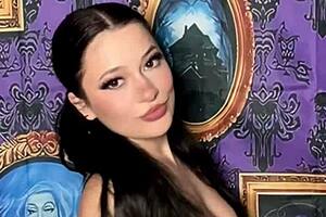 Watch this pigtails goth girl take off her bra in haunted house with music!