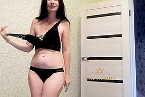 horny russian brunette milf angela-milf with saggy tits and hairy beaver strips on bed bends over doggystyle shows huge ass