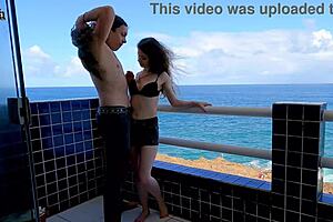 enjoying some fun on the terrace overlooking the ocean with dollscult