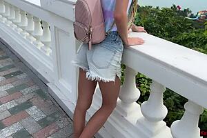 Girl assists in public adventure on ferris wheel