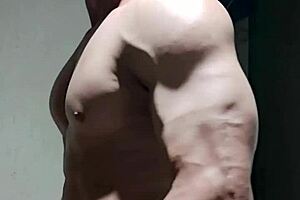Strong Muscular Man with Huge Endowment Shows Off in Homemade Video