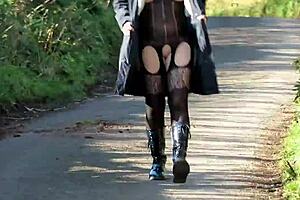 outdoors wearing that intriguing kinky gear setup