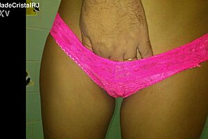 brazilian latina wife teases shaved pussy with pink panties close up