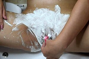 wanna watch this hairy teen pussy get shaved smooth with trimmer and razor close-up