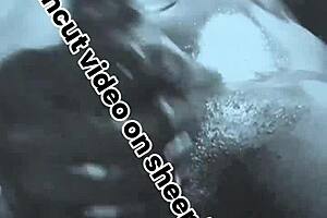 check this sneak peek... horny black oiled bodybuilder masturbates huge cock interracial