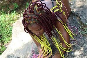 Ebony babe stuffs dildo deep in juicy forest pussy solo