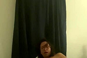 mature latina strips slow showing off body in glasses