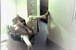 busty office babe hides cam toys pussy with dildo at work