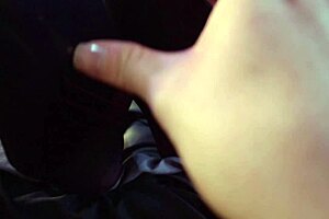 metal chick kicks off long boots for socked footjob tease