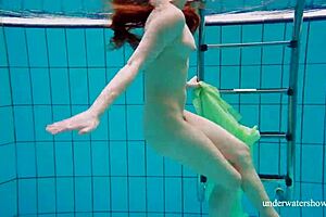 nina mohnatka swims poolside as russian blonde teen