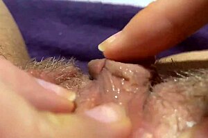 Close-up big clit throbs through explosive orgasm