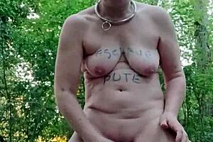 female slave bound outdoors in forest adventure unfolds