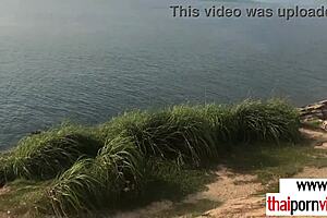 Wanna see this petite Thai teen's quick beach blowjob for her boyfriend?
