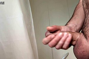 Masturbation before a hot bath with close up big cock action