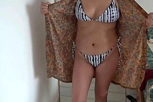 stepmom puts on bikini after creampie and shows off at beach